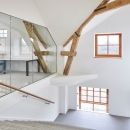 A stair with on the left side a partition wall of QbiQ
