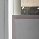 Corder detail of a partial glass and partial closed wall