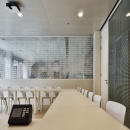 Small collage room with single glass partition walls an HPL door