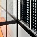 Corner detail of an old fashion industrial look glass partition  