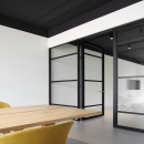 Double doors in a classic industrial glass wall