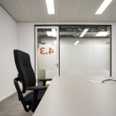Office with a demountable glass wall.