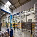 Glass deviding wall in production hall at Graf Holland in Enschede