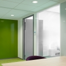 Partition with a combination of steel and glass panels