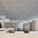 Decorative text on the ceiling of the restaurant at Leiden University College The Hague
