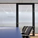 Glass partition with sandblast foil