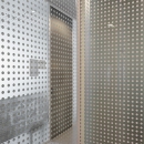 Single glass demountable glass wall with a dots print