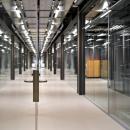 Corridor with glass partition walls of QbiQ