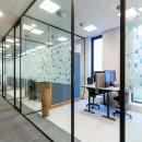Cabinet enclosed in a single glass partition