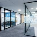 Corridor with view on a concentration room with glass partition