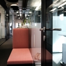 Hallway with double glass partitions