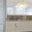 Closeup text design foil on glass wall