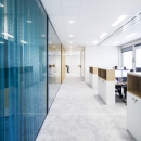 Blue colored single glass partitions walls