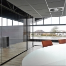 universal free standing glass convfrence room 
