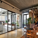 Full glass partition with double doors