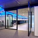 Aluminum framed pivoting door with glass at The Flow Houthavens Amsterdam.