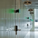 Double glass partitions with KDD90F framed door and room reservation display 