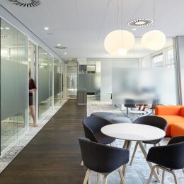 Offices made of double glass partition wall with high acoustic values.