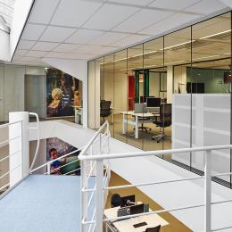 Fall through safe full glass fire resistant glass EI60 wall and at UNICEF in The Hague, The Netherlands.