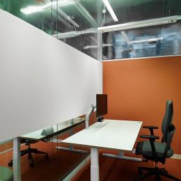 Acoustic panels glued on a glass wall to absorb the sound
