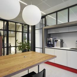 Kitchen with pantry built into IQ-Pro glass wall