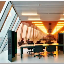 Working space with QbiQ partition wall covered with a pink film