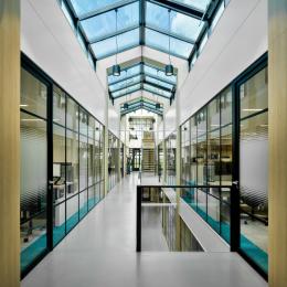 Corridor on the first floor with safety glass on the right