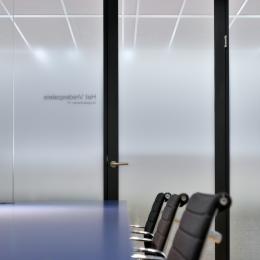 Office with glass partition with sandblast foil