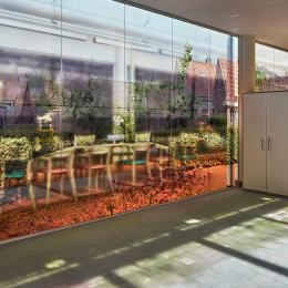 Full color photo print on a single glass partition wall