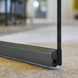 Glass door with dropseal to reduce sound under the door