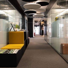 Hallway with glass partitions on both sides