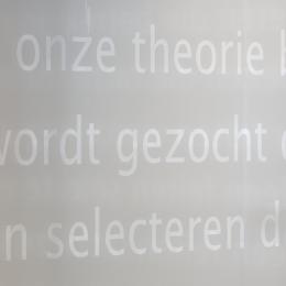 Closeup text design foil on glass wall