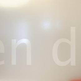 Closeup text design foil on glass wall