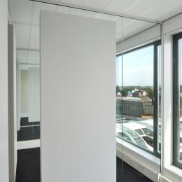 iQ Mute Acoustic panels on a iQ Single glass wall
