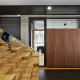 Glass partition with integrated cabinets at Floating Office in Rotterdam.