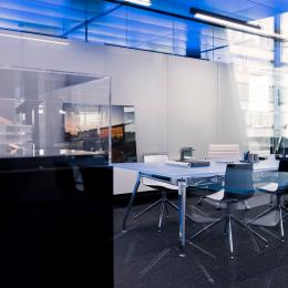 Office dividing glass wall with decorative panels