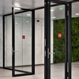 IQ Protect Fire EW30 fire resistant glass wall with multiple double doors