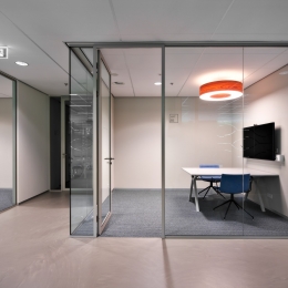 Aluminum framed door in glass partition