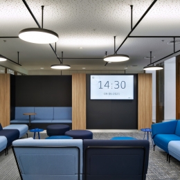 Single glass partition with wood elements added