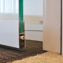 Drop seal under a tempered glass door