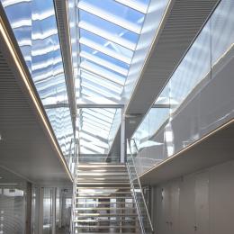 Main stairway with a lot of glass 