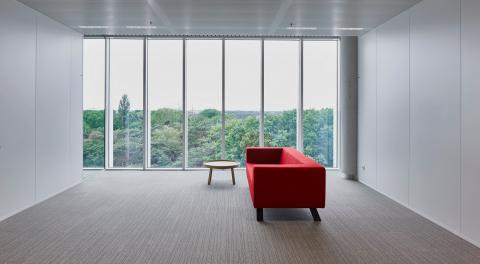 Vestibule of the board room with closed partitions and partial glass