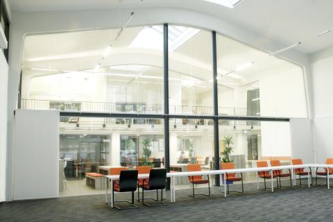 Extra high arc shape glass wall with steel construction and double doors