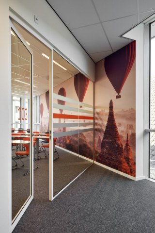 Glass partition wall and framed door at Seeligkazerne Breda, the Netherlands.