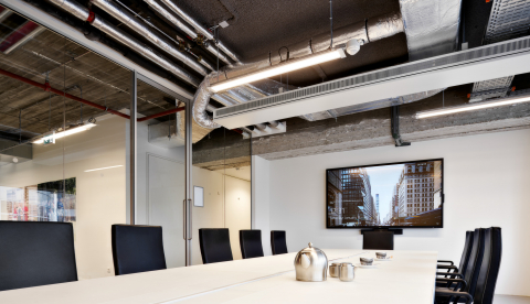 Inside a meeting room with glass partition wall and sliding door