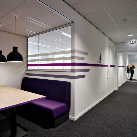 Single glass partition placed in existing wall