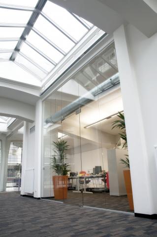 Full glass partition with special fitting at Stadswonen Rotterdam