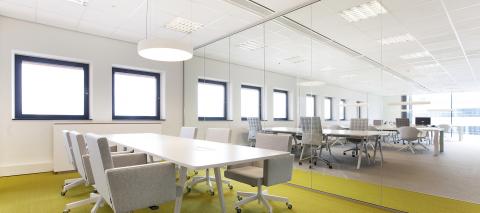 Conference room with single glass partitions wall.