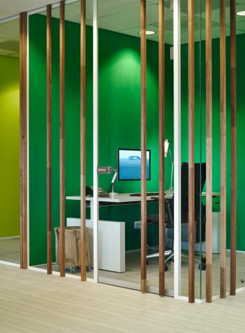 Wood construction on the glass of a office partition