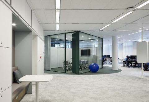 Small conversation room partial made of double glass and closed panels